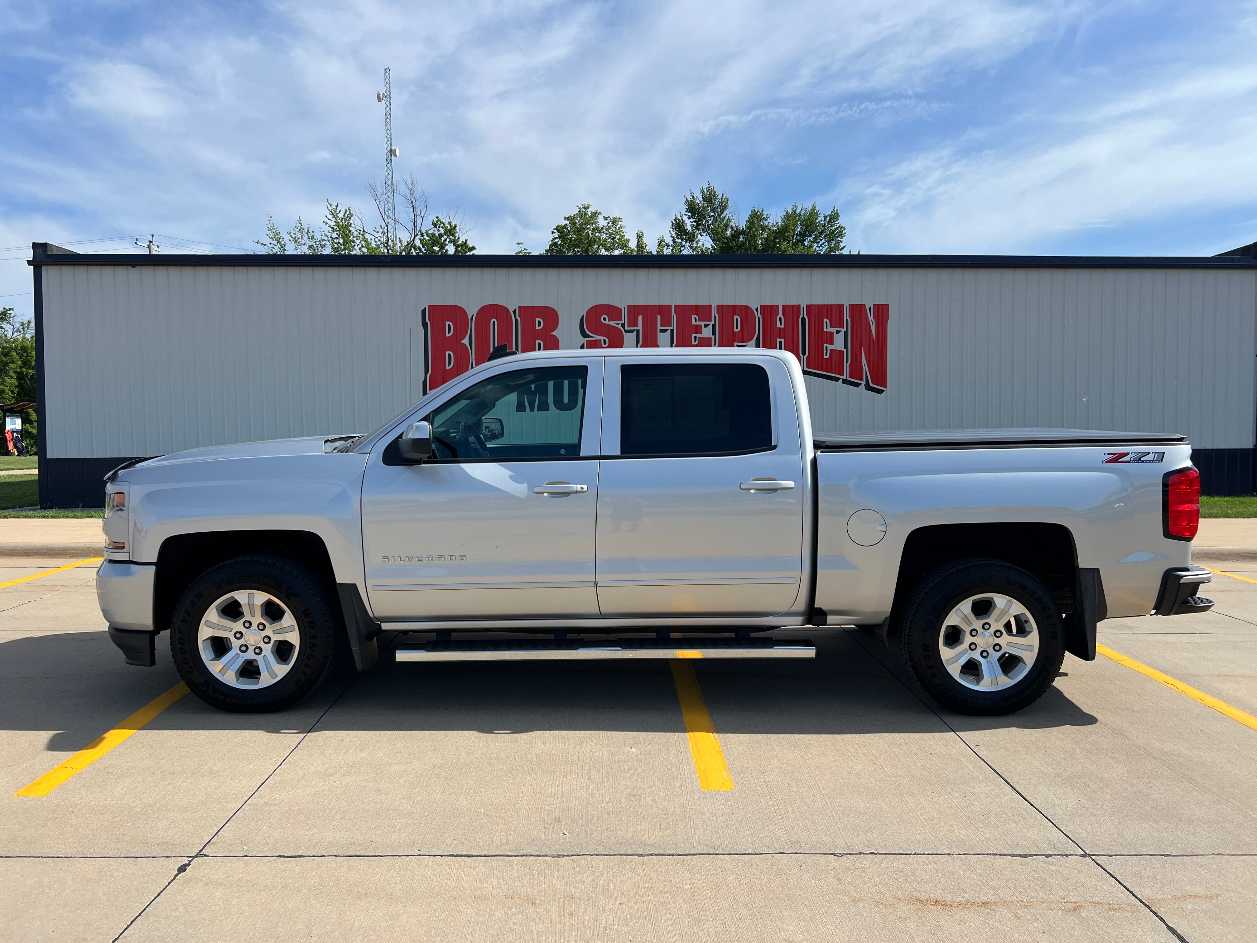 2018 Chevrolet Silverado 1500 LT in Silver Ice Metallic — front three-quarter view